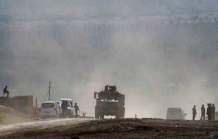 A Turkish Army vehicle leaves from a military post near the Turkish-Syrian border in Kilis province, Turkey January 31, 2018. REUTERS/Osman Orsal