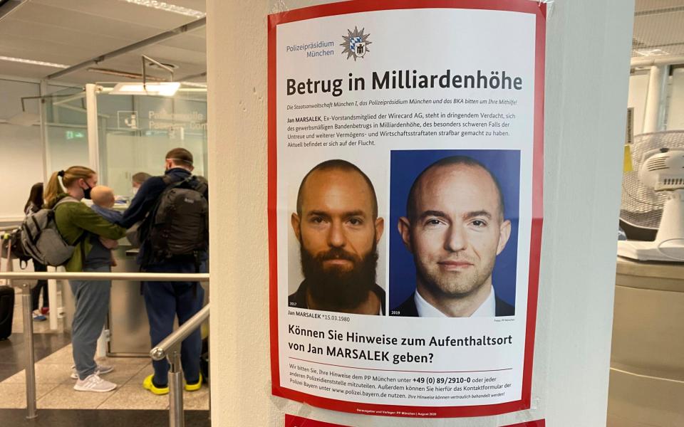 A wanted poster for Marsalek at Munich Airport