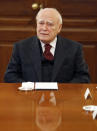 FILE - Greek President Karolos Papoulias speaks during a meeting with NATO Secretary General Anders Fogh Rasmussen, not seen, at the Presidential Palace in Athens, Thursday, Feb. 16, 2012. Papoulias, a former President of Greece, has died at the age of 92, Greece's state news agency ANA reported on Sunday, Dec. 26, 2021. Papoulias, a lawyer by training, was close to socialist leader Andreas Papandreou and served in all his governments from 1981-1996, all in foreign affairs positions, ending as Foreign Minister. (AP Photo/Thanassis Stavrakis, File)