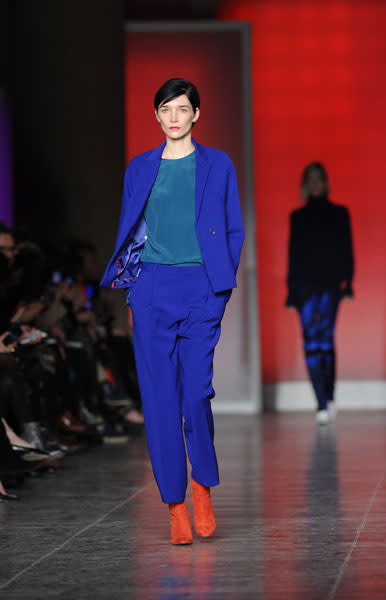 <b>LFW AW13: Paul Smith </b><br><br>The designer teamed cobalt blue suits with orange suede boots.<br><br>© Getty