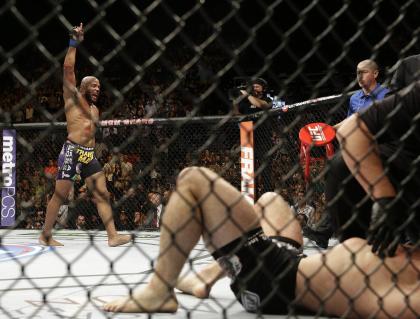 Yoel Romero celebrates after defeating Tim Kennedy during his last fight at UFC 178. (AP)