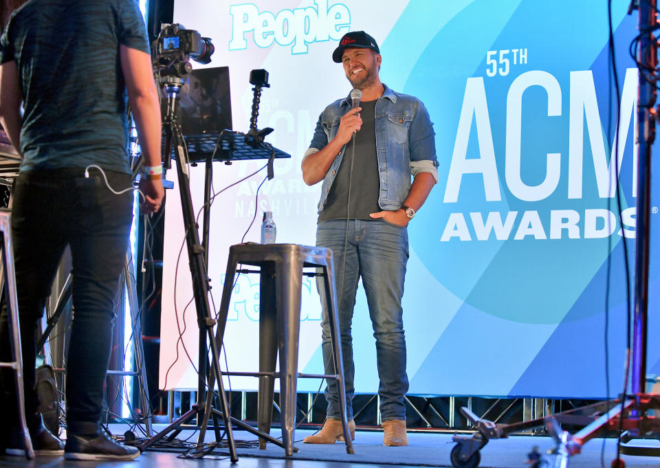 <p>Luke Bryan takes the mic at virtual radio row during the 55th Academy of Country Music Awards at Gaylord Opryland Resort & Convention Center on Monday in Nashville.</p>