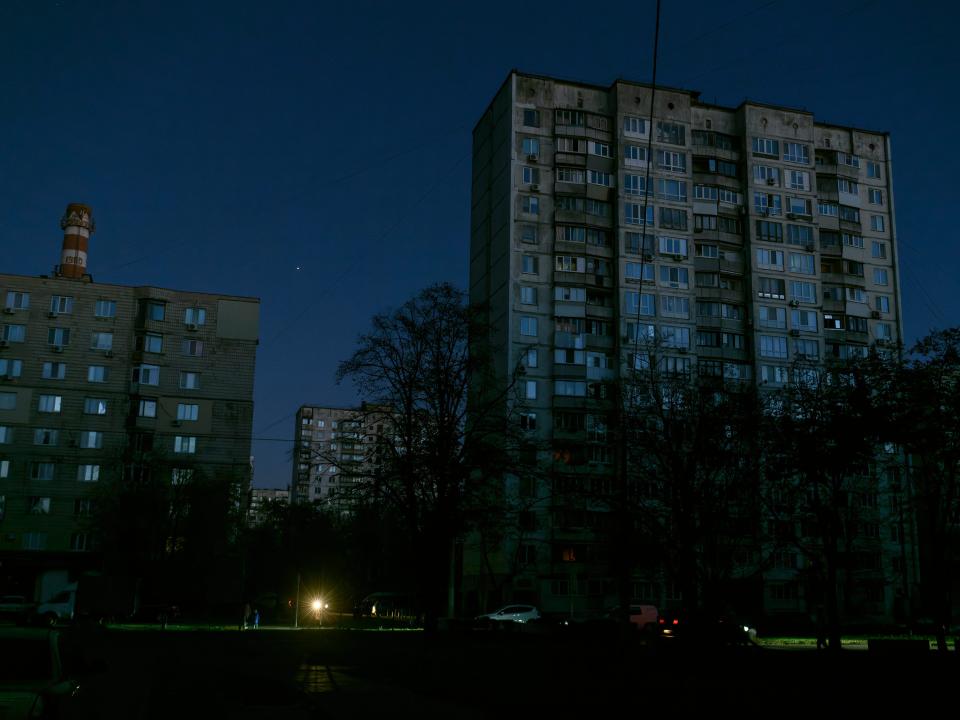 An apartment building with no lights on.