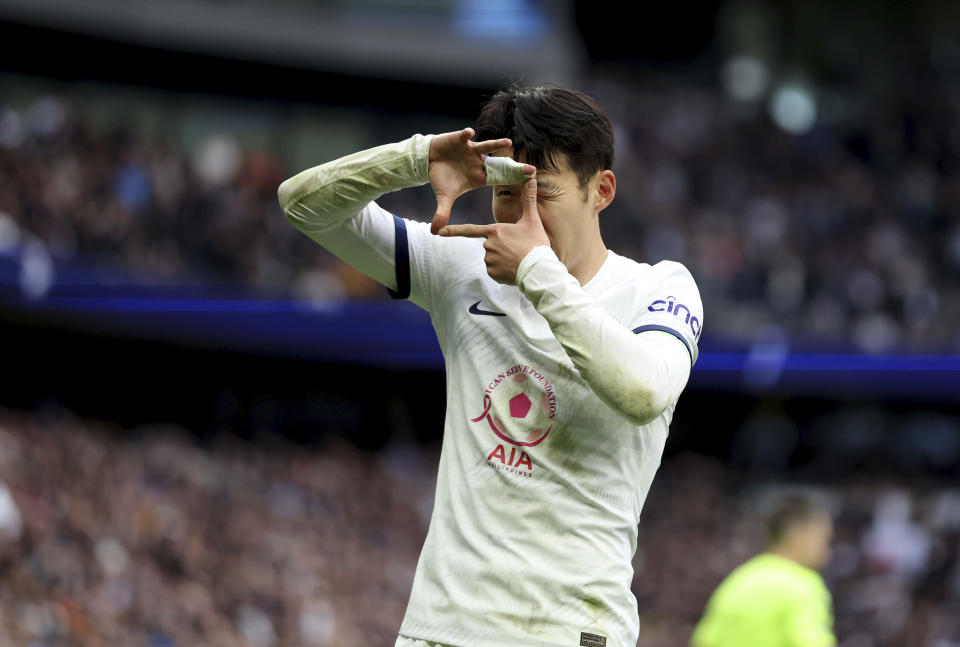 Tottenham Hotspur's Son Heung-Min celebrates after scoring his sides second goal during the English Premier League soccer match between Tottenham Hotspur and Luton Town at the Tottenham Hotspur Stadium, London, Saturday, March 30, 2024. (Steven Paston/PA via AP)