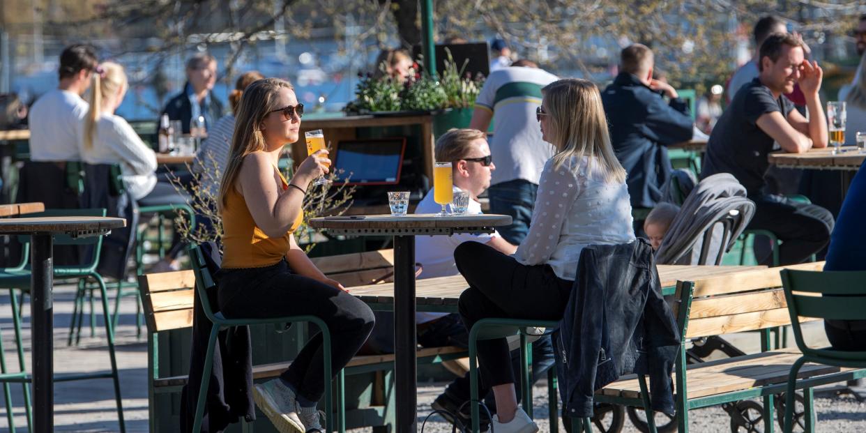 People socialize and enjoy the spring, as the coronavirus disease (COVID 19) outbreak continues, in Stockholm, Sweden, April 22, 2020..JPG