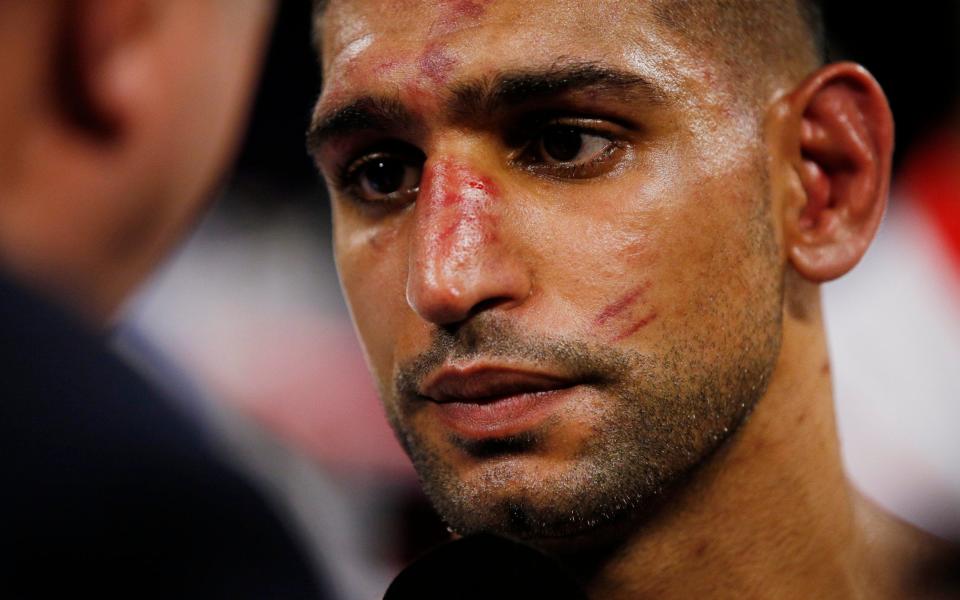 Khan was forced to retire in the sixth round against Terence Crawford - Action Images via Reuters