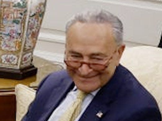 Sen. Chuck Schumer sits in the Oval Office on Tuesday, May 16.