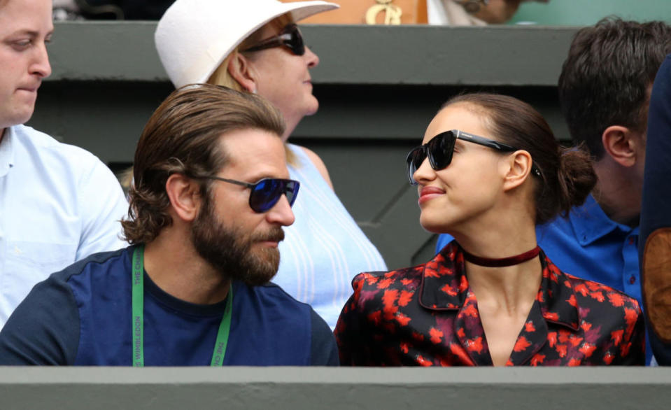 <p>Back for their second day of tennis viewing following Irina’s stint at Haute Couture Fashion Week in Paris, Bradley Cooper and girlfriend Irina Shayk were spotted on Centre Court.<i> [Photo: Rex]</i></p>