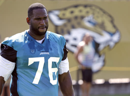 Branden Albert told the Jaguars he wants to play again, after retiring last week. (AP)