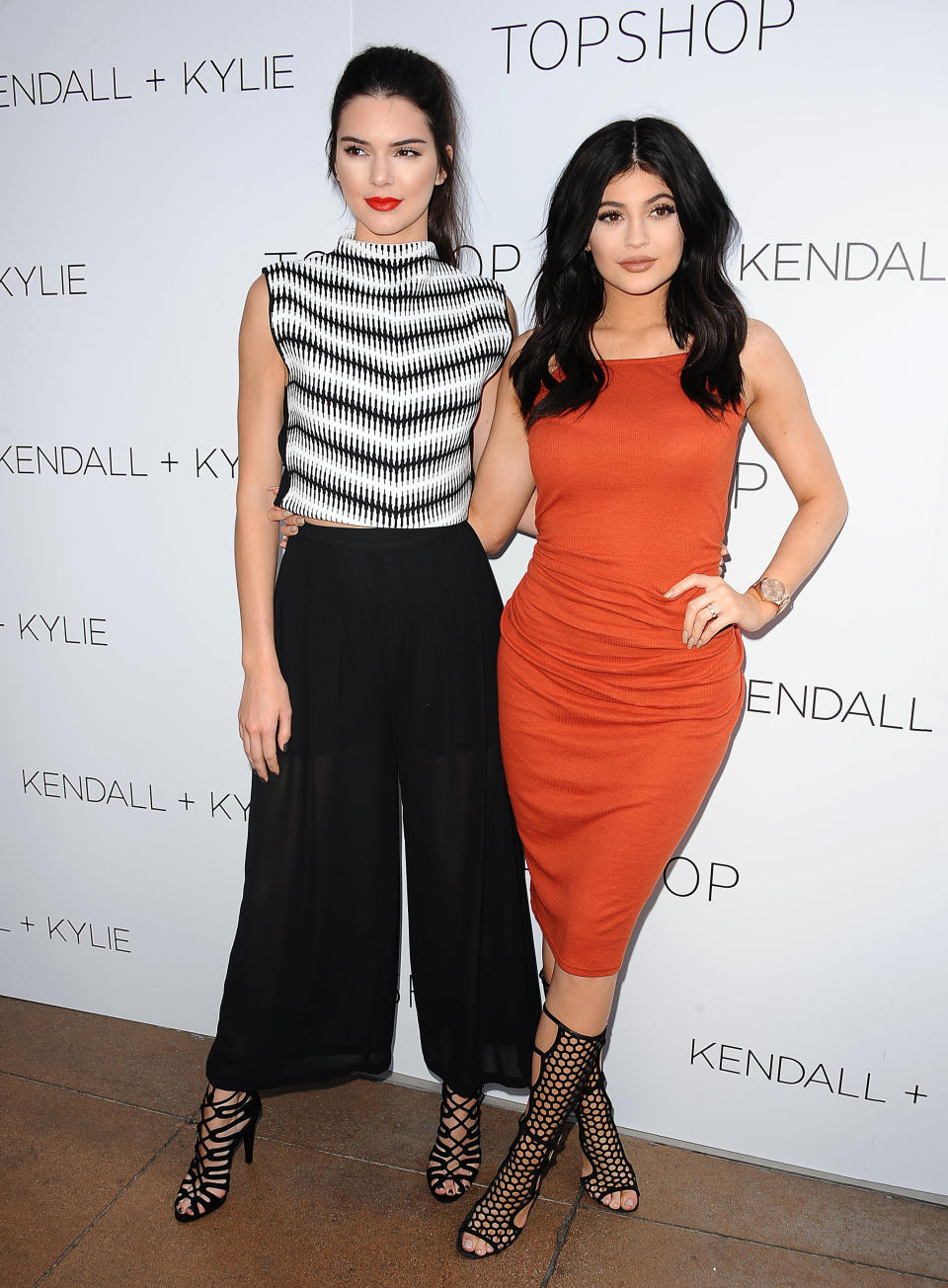 LOS ANGELES, CA - JUNE 03:  Kendall Jenner and Kylie Jenner attend the Kendall + Kylie fashion line launch party at TopShop on June 3, 2015 in Los Angeles, California.  (Photo by Jason LaVeris/FilmMagic)