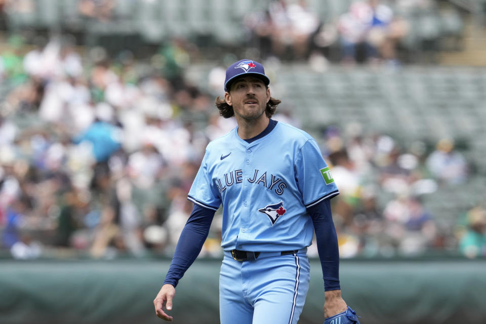 Toronto Blue Jays' Kevin Gausman walks to the dugout after pitching against the Oakland Athletics during the second inning of a baseball game Saturday, June 8, 2024, in Oakland, Calif. (AP Photo/Godofredo A. Vásquez)