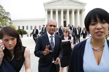 Aereo CEO and founder Chet Kanojia (C) departs the U.S. Supreme Court in Washington April 22, 2014. REUTERS/Jonathan Ernst