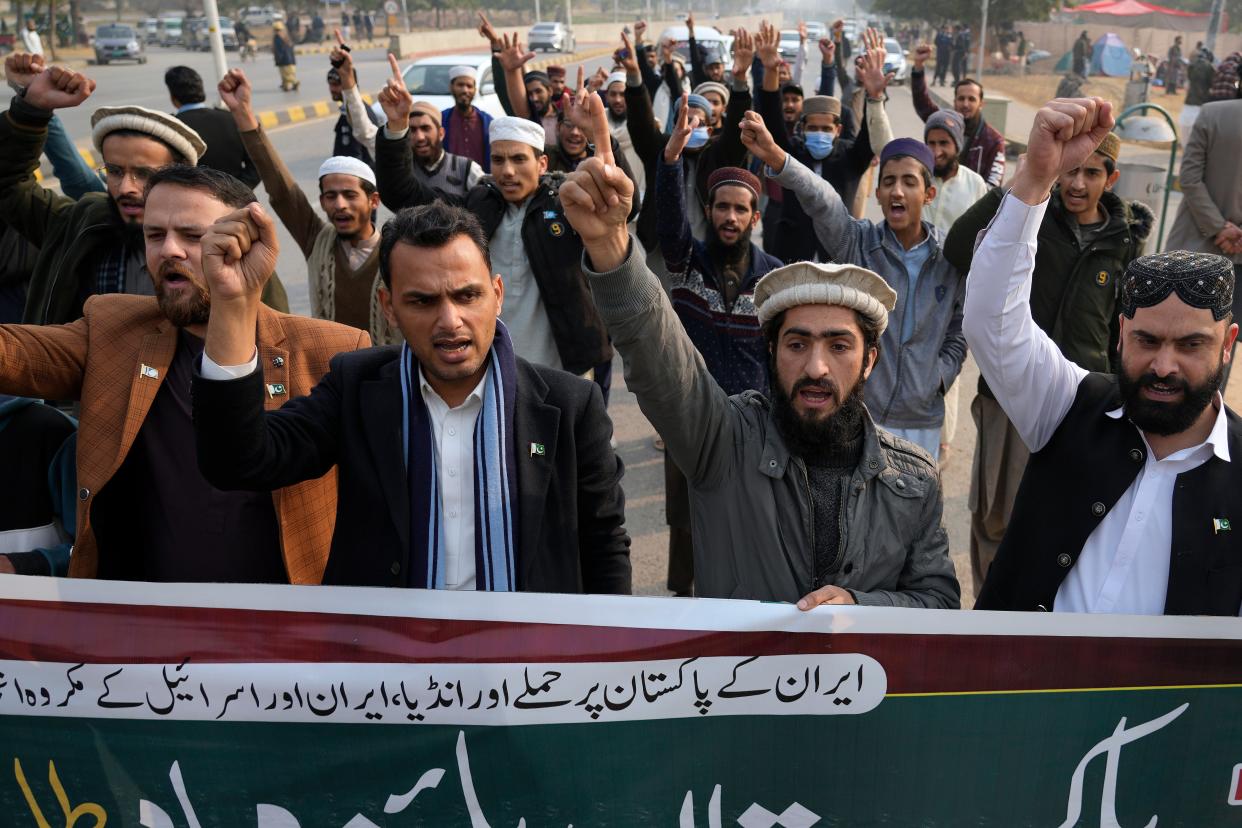 Members of Muslim Talba Mahaz Pakistan chant slogans at a demonstration to condemn Iran strike in the Pakistani border area, in Islamabad, Pakistan (AP)
