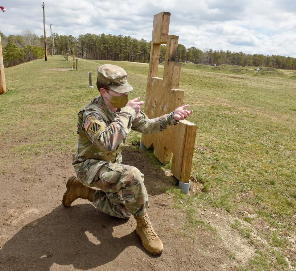 Major Alex McDonough shows how soldiers line up their sites at Sierra firing Range at Joint Base Cape Cod on April 22, 2021.