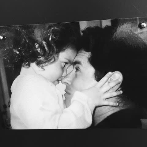 <p>Gracie Abrams Instagram</p> Singer-songwriter Gracie Abrams as a child hugging her dad J.J. Abrams.