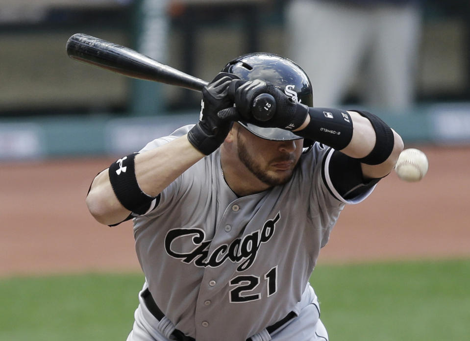 Chicago White Sox's Tyler Flowers is hit by a pitch from Cleveland Indians starting pitcher Justin Masterson in the fifth inning of a baseball game, Saturday, May 3, 2014, in Cleveland. (AP Photo/Tony Dejak)