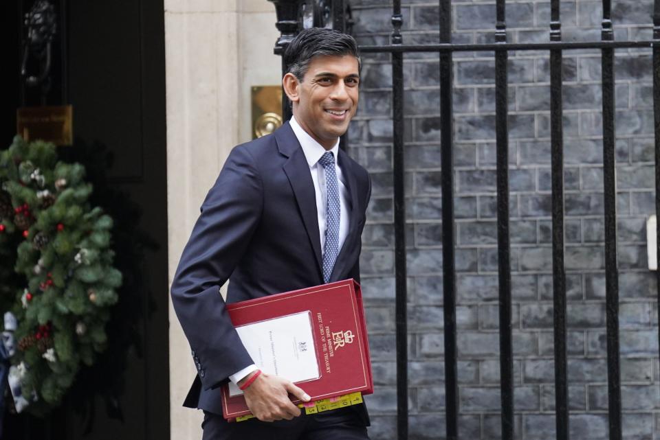 Rishi Sunak leaves Downing Street on December 7 as he makes his way to Parliament for Prime Minister’s Questions (PA)