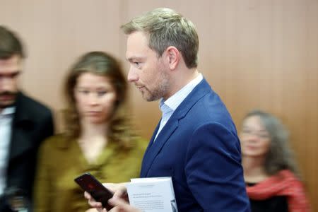 Germany's Free Democratic Party FDP leader Christian Lindner attends the presentation of his new book " Shadow years. The return of political liberalism" in Berlin, Germany, October 19, 2017. REUTERS/Axel Schmidt