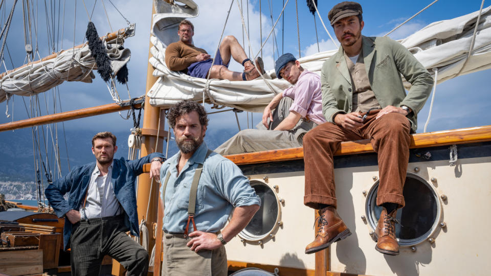 Several members of The Ministry of Ungentlemanly Warfare posed on boat deck.