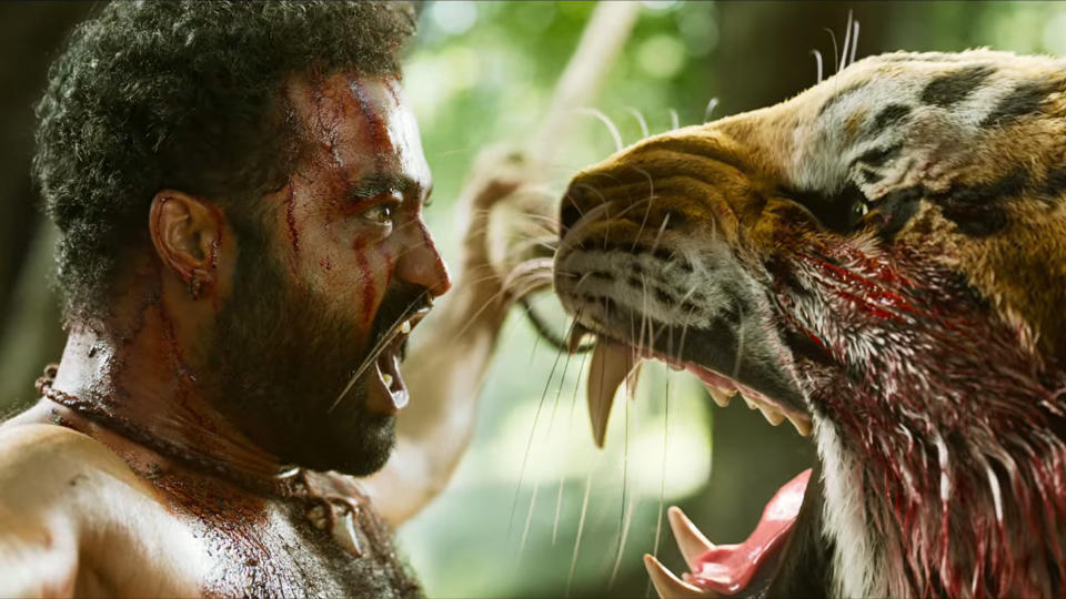 Bheem faces off with a roaring tiger.