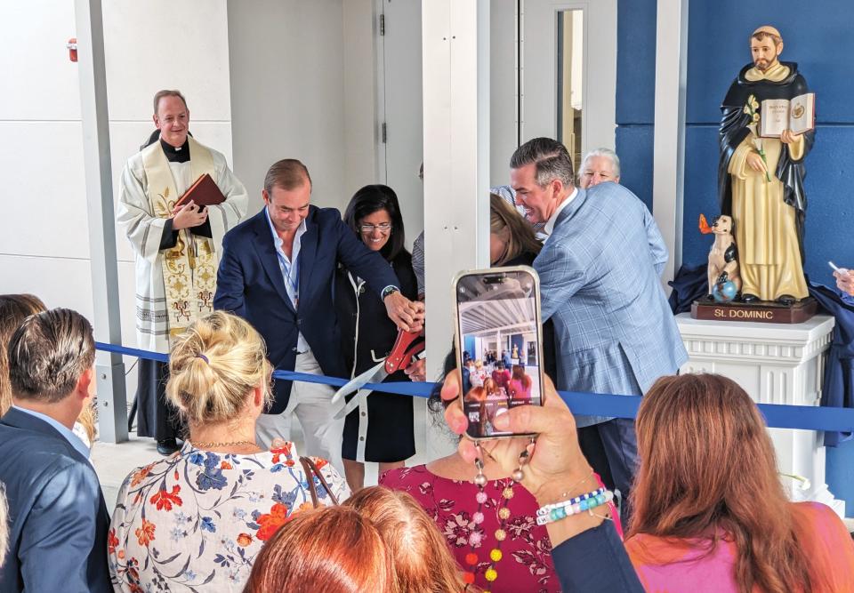 Ribbon cutting for the new Stockard Learning Center at Rosarian Academy: (from left to right) Nick Coleman, Linda Trethewey, Nicholas Coniglio (blocked), Danielle Hickox Moore (blocked), Shaun McGruder.