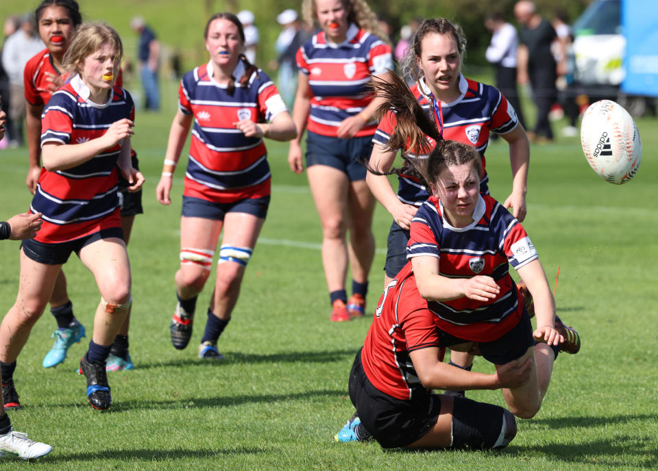 New Zealand students playing rugby