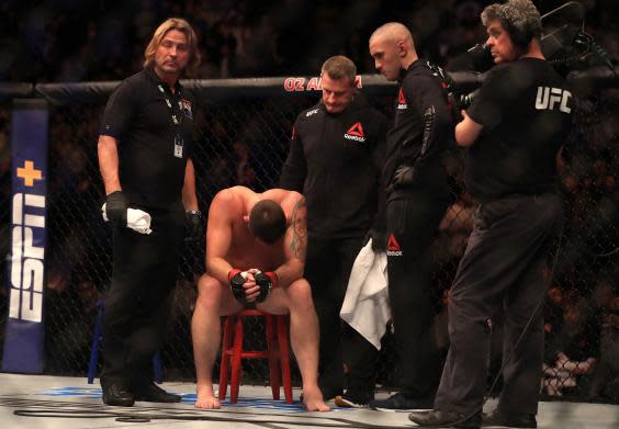 Till took minutes to regain consciousness before leaving the Octagon (PA)