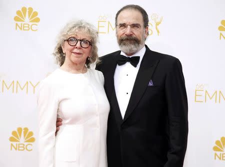 Actor Mandy Patinkin from the Showtime drama series "Homeland" arrives with his wife writer Kathryn Grody at the 66th Primetime Emmy Awards in Los Angeles, California August 25, 2014. REUTERS/Lucy Nicholson