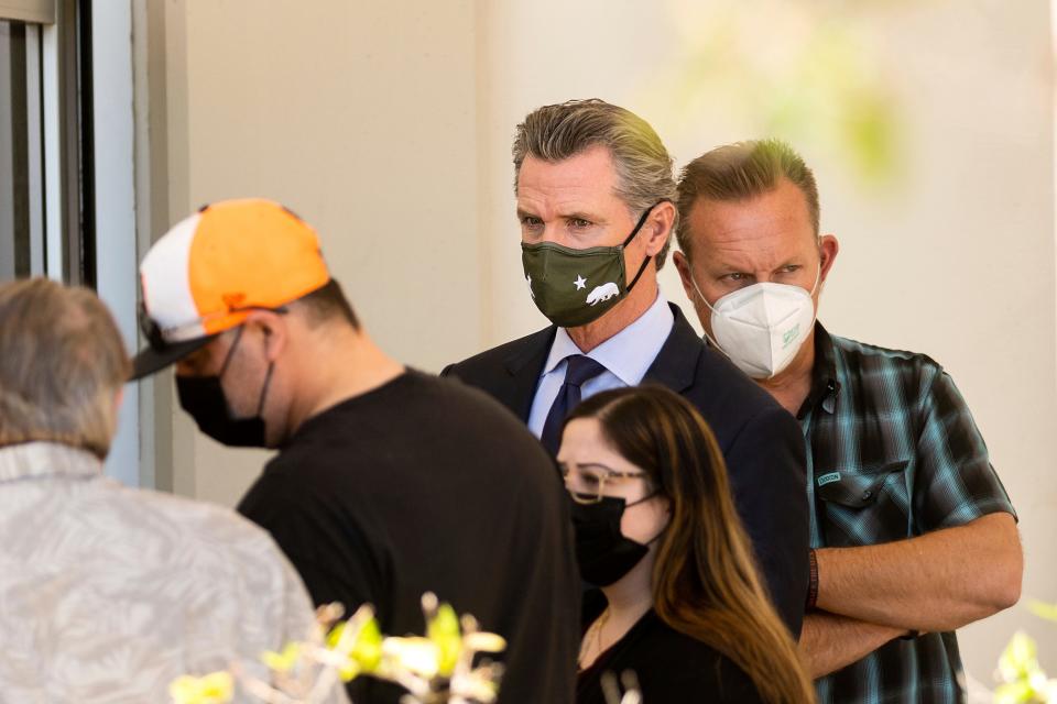 California Gov. Gavin Newsom met with family members of the dead on Wednesday. At a news conference, he expressing frustration with the cycle of mass shootings in the U.S.