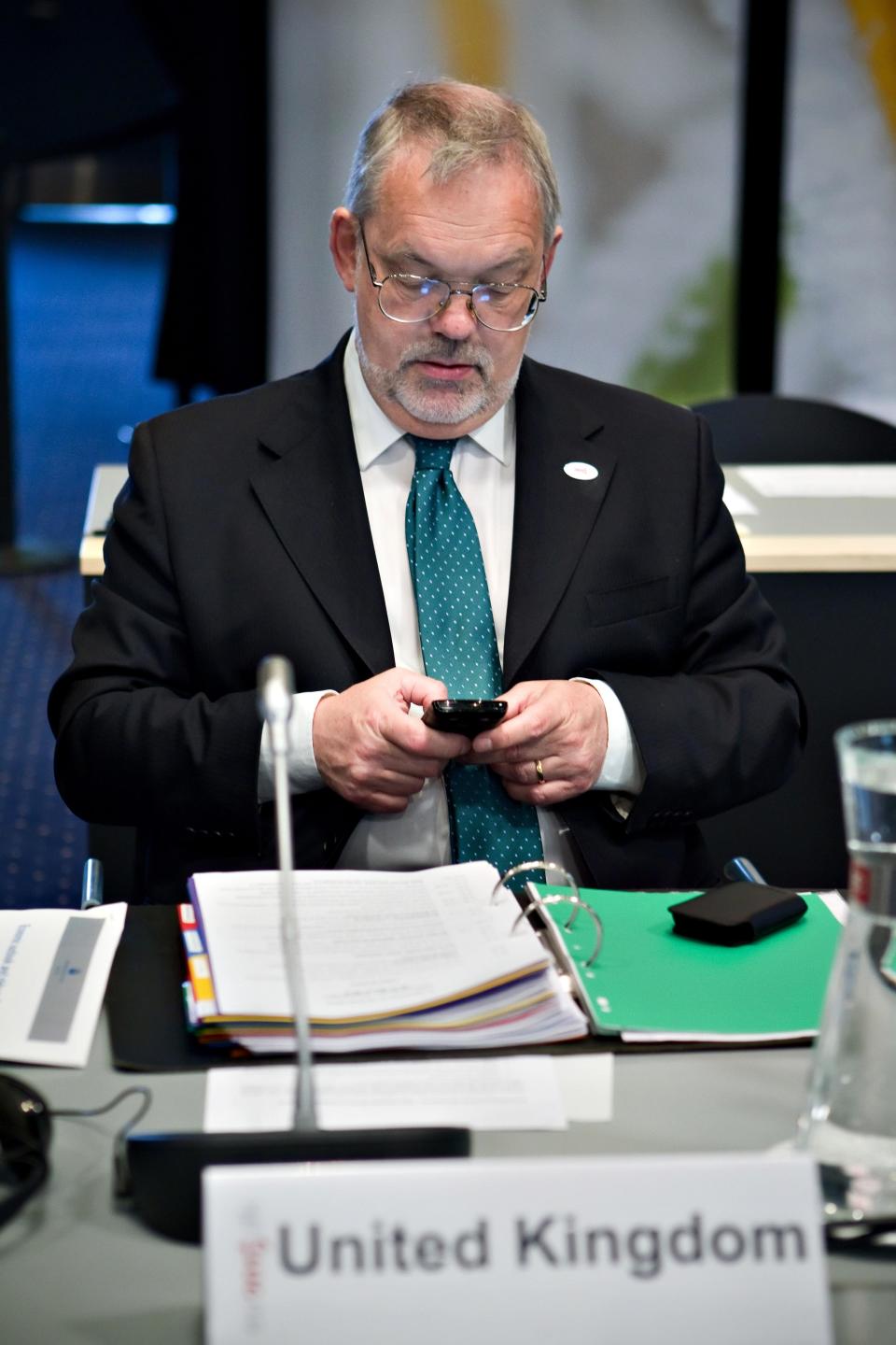 Deputy Governor of the Bank of England Charles Bean prepares for the second day of a eurozone finance ministers meeting, in Copenhagen, Denmark Saturday March 31, 2012. Several European finance chiefs said Friday the 17 countries that use the euro are unlikely to boost their financial backstop to the Euros1 trillion ($1.3 trillion) demanded by many of their international partners. (AP Photo/Lars Krabbe/Polfoto) DENMARK OUT