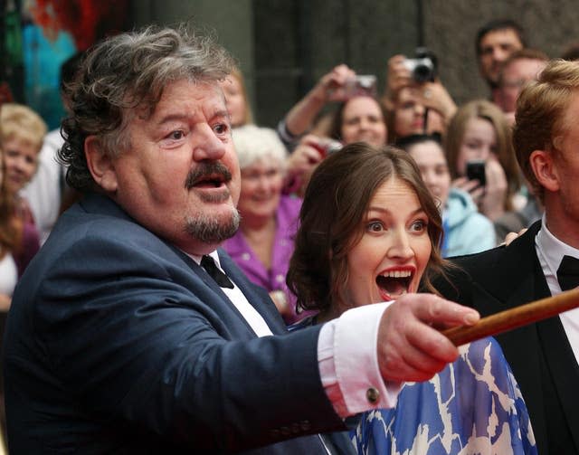 Robbie Coltrane and Kelly Macdonald attend the film premiere of “Brave” at the Festival Theatre in Edinburgh on June 30, 2012. 