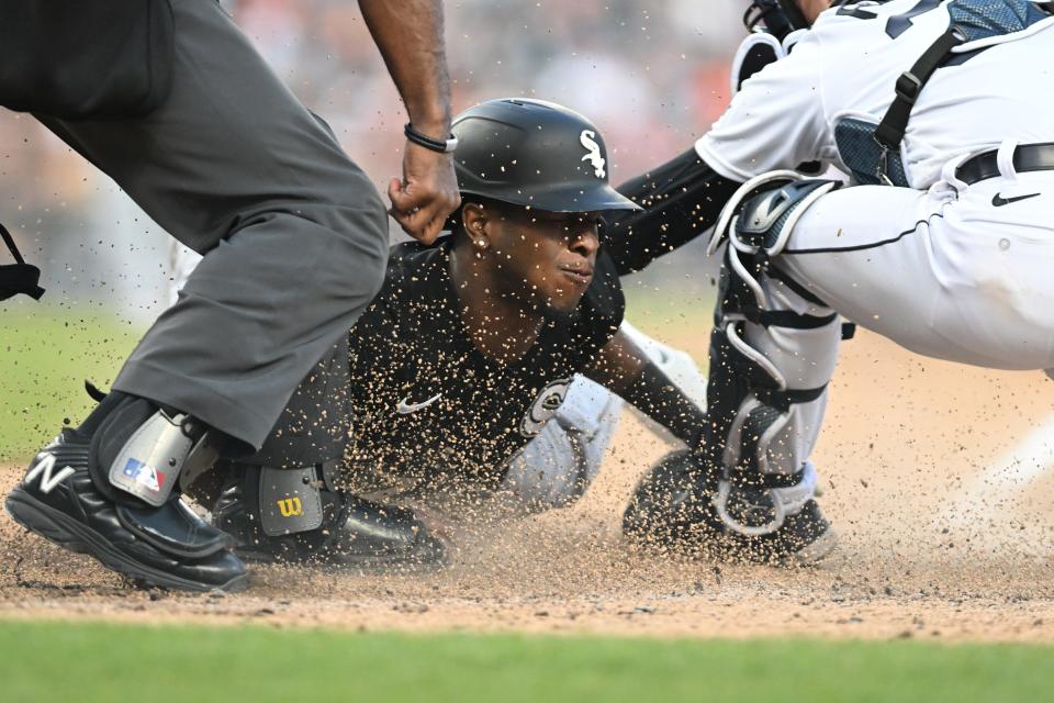 Chicago White Sox shortstop Tim Anderson (7) is tagged out at home plate by Detroit Tigers catcher Jake Rogers (34) in the sixth inning at Comerica Park in Detroit on Friday, May 26, 2023.