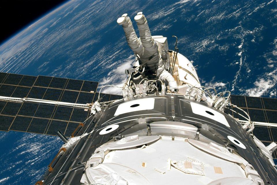 Jim Newman works outside of the Unity module of the International Space Station (file photo) (AFP/Getty Images)