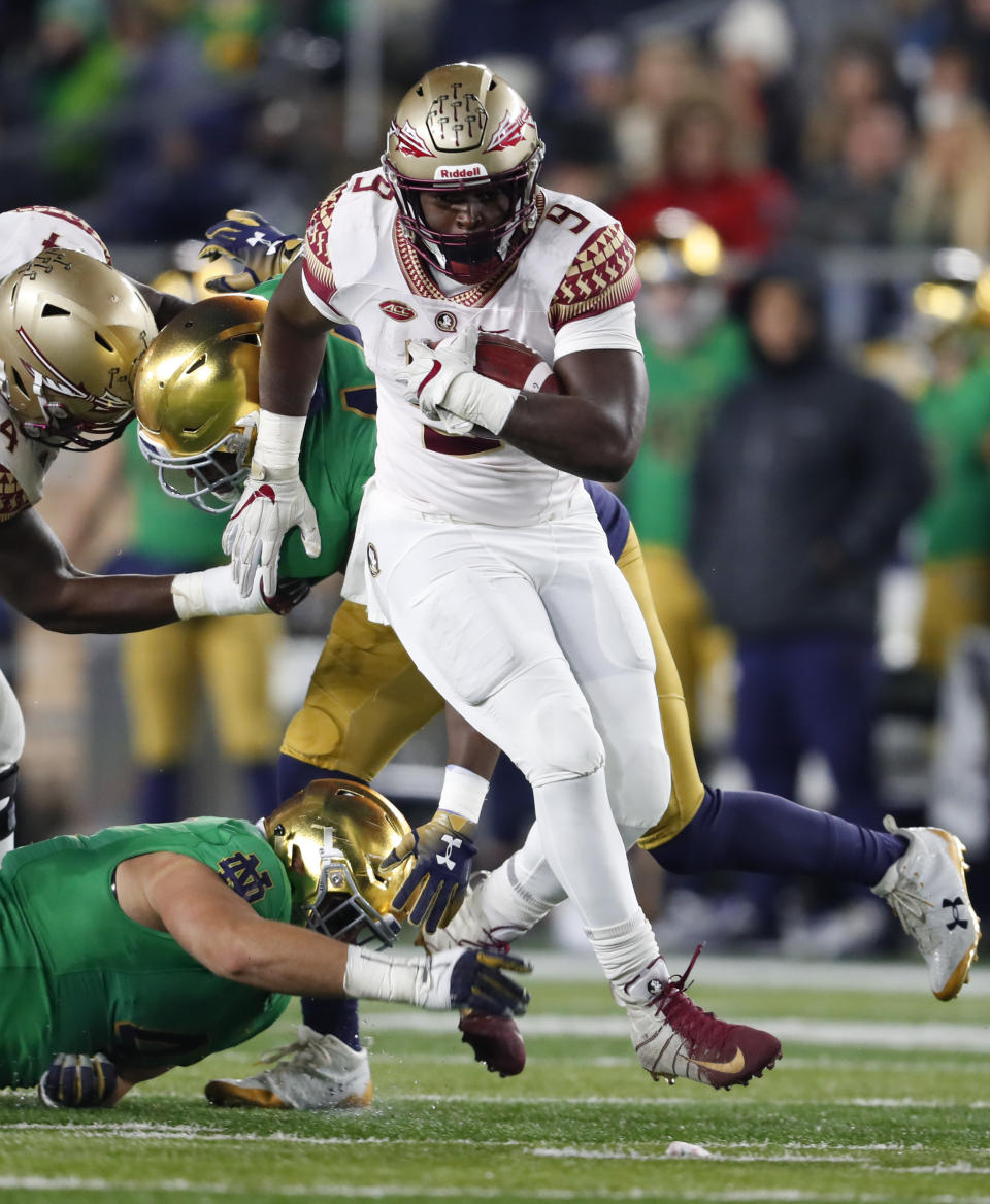 Florida State running back Jacques Patrick (9) runs against Notre Dame in the first half of an NCAA college football game in South Bend, Ind., Saturday, Nov. 10, 2018. (AP Photo/Paul Sancya)