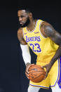 Los Angeles Lakers forward LeBron James poses for photos during the NBA basketball team's media day in El Segundo, Calif., Friday, Sept. 27, 2019. (AP Photo/Ringo H.W. Chiu)