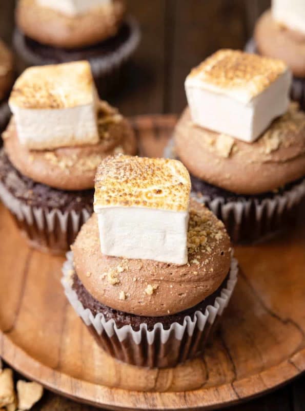 <p>The Country Cook</p><p>Chocolate cake, graham crackers, marshmallows, oh my!</p><p><strong>Get the recipe: <a href="https://www.thecountrycook.net/smores-cupcakes/" rel="nofollow noopener" target="_blank" data-ylk="slk:S'mores Cupcakes;elm:context_link;itc:0;sec:content-canvas" class="link rapid-noclick-resp">S'mores Cupcakes</a></strong></p>