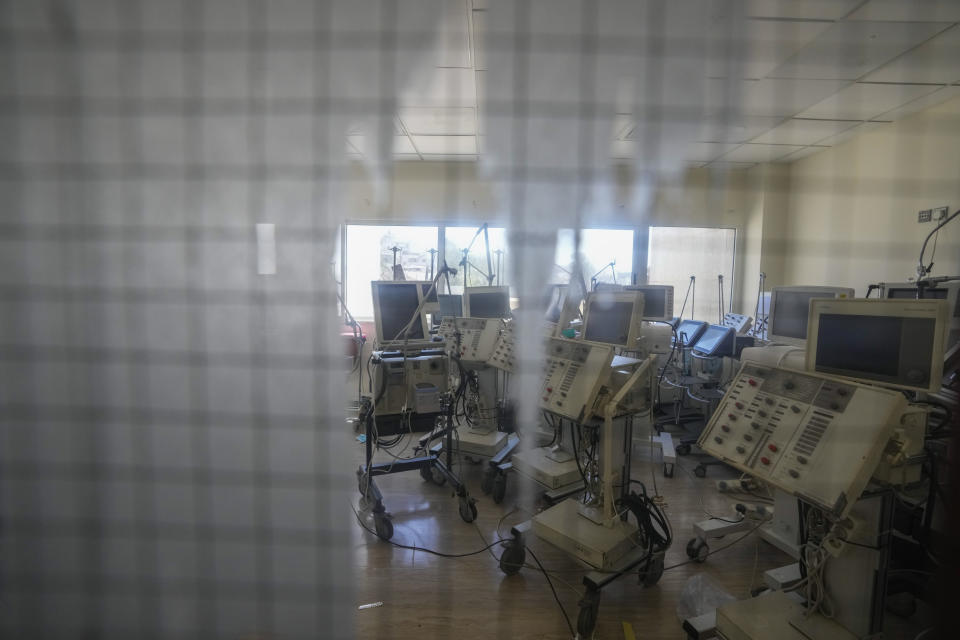 Medical machines stored inside a room at the government-run Rafik Hariri University Hospital in Beirut, Lebanon, Wednesday, Aug. 11, 2021. Many private hospitals, who offer 80% of Lebanon's medical services, are shutting down because of lack of resources or turning away patients who can't pay. (AP Photo/Hassan Ammar)
