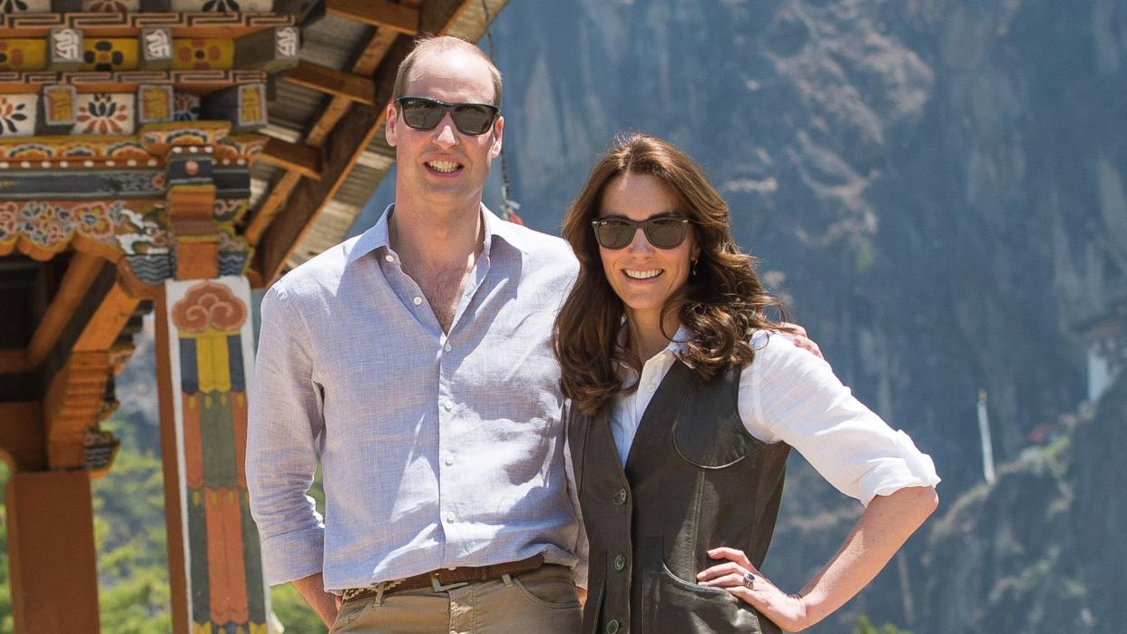 Prince William and Kate pose together as they hike to Paro Taktsang, the Tiger's Nest monastery on April 15, 2016 in Paro, Bhutan