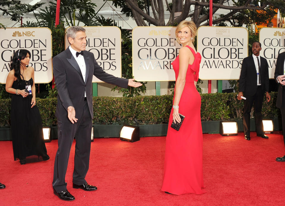 BEVERLY HILLS, CA - JANUARY 15: Actors George Clooney and Stacy Keibler arrive at the 69th Annual Golden Globe Awards held at the Beverly Hilton Hotel on January 15, 2012 in Beverly Hills, California. (Photo by Jason Merritt/Getty Images)