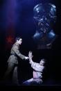 Actors Hong Kwang-Ho (L) and Jon Jon Briones perform as Thuy and The Engineer during a photocall for a new production of "Miss Saigon" at the Prince Edward Theatre in London May 19, 2014. The production marks the 25th anniversary of the musical by Claude-Michel Schonberg and Alain Boubil. REUTERS/Luke MacGregor (BRITAIN - Tags: ENTERTAINMENT)