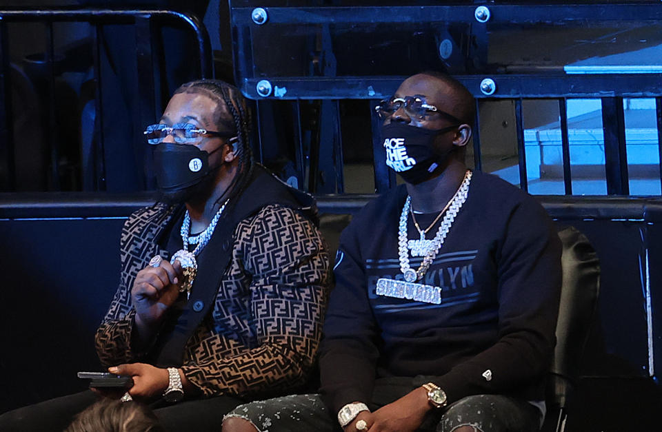 rappers Rowdy Rebel and Bobby Shmurda wearing black 