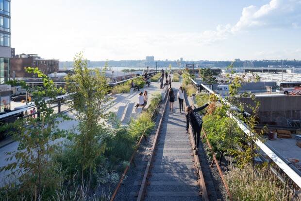 New York's massively popular High Line Park weaves its way between Manhattan's West Side towers on a converted elevated train track. 