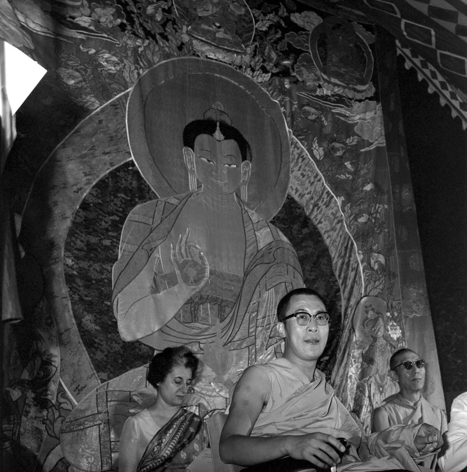 The Dalai Lama sits with Indian politician Indira Gandhi in November 1965 in India.&nbsp;