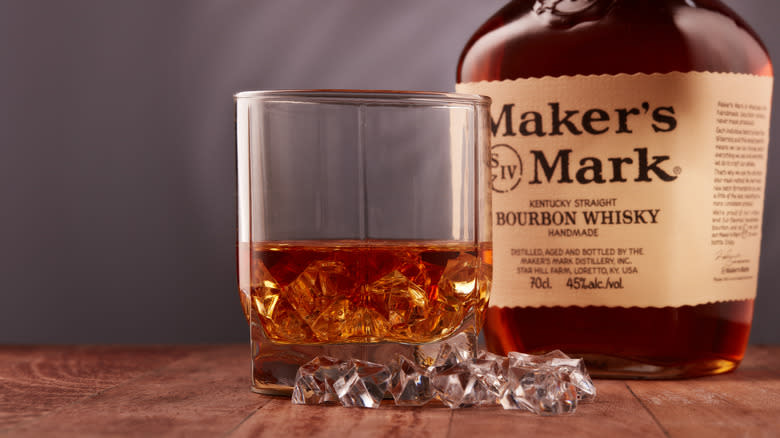 Bottle of Maker's Mark Bourbon with glass