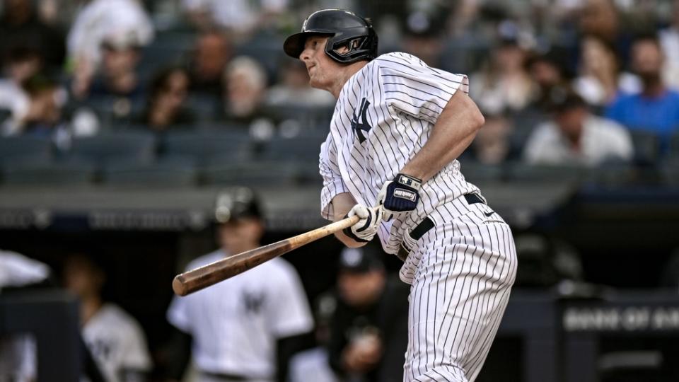 New York Yankees third baseman DJ LeMahieu (26) hits a single against the Boston Red Sox during the first inning at Yankee Stadium