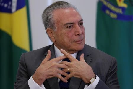 Brazil's President Michel Temer reacts during a ceremony at the Planalto Palace in Brasilia, Brazil April 12, 2017. REUTERS/Ueslei Marcelino