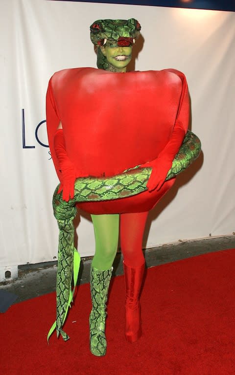Heidi Klum dressed as an apple at Halloween in 2006 - Credit: Rex
