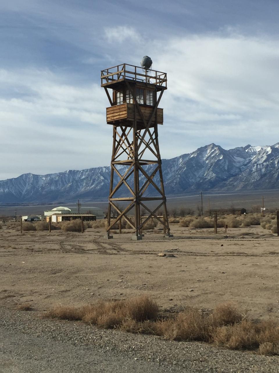 Manzanar guard tower, with gymnasium in distance is part of Tim's column this week.