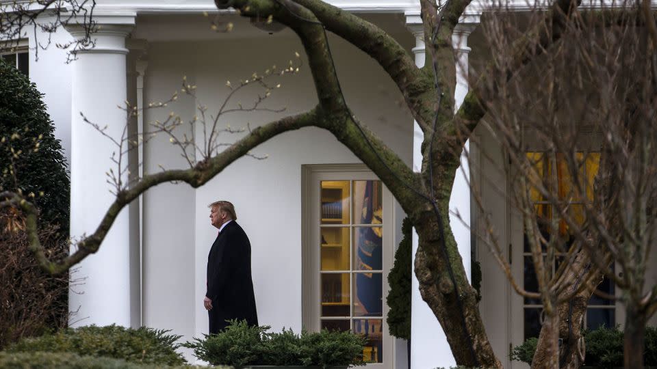 In this February 2020 photo, then-President Donald Trump walks out of the Oval Office of the White House to board Marine One in Washington, DC.  - Zach Gibson/Bloomberg/Getty Images