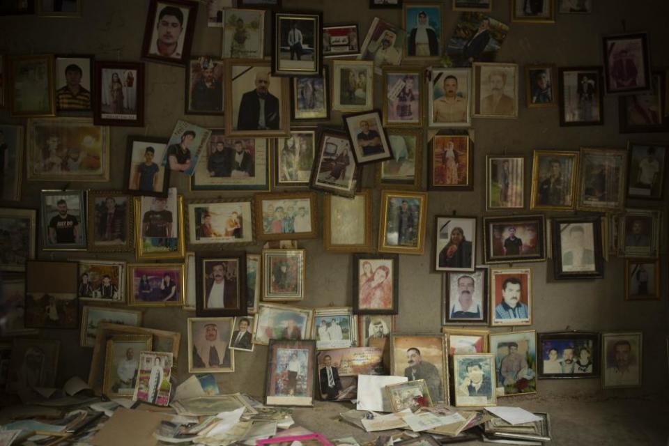 Photographs of Yazidis killed in 2014 by Isis militants at the Lalish temple, above the town of Shekhan, in northern Iraq, on 12 September 2019.